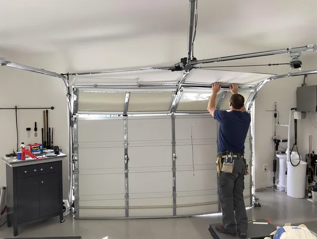 Wildomar Garage Door Repair specialist performing precise section replacement on Wildomar garage door
